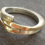 Silver and gold designer ring