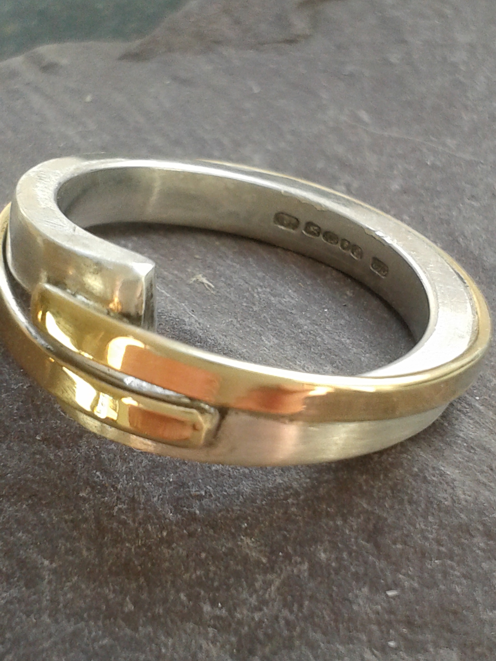  silver  and gold  ring 