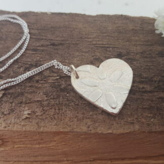 Flowery silver heart pendant