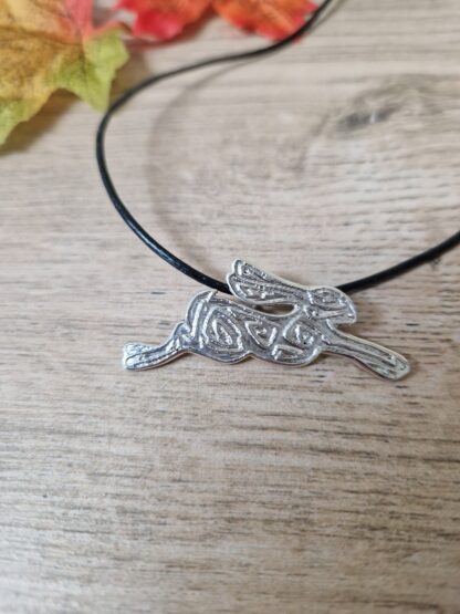 Perseus etched silver hare pendant